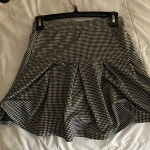 Black and white plaid skirt great condition mid length but kinda short